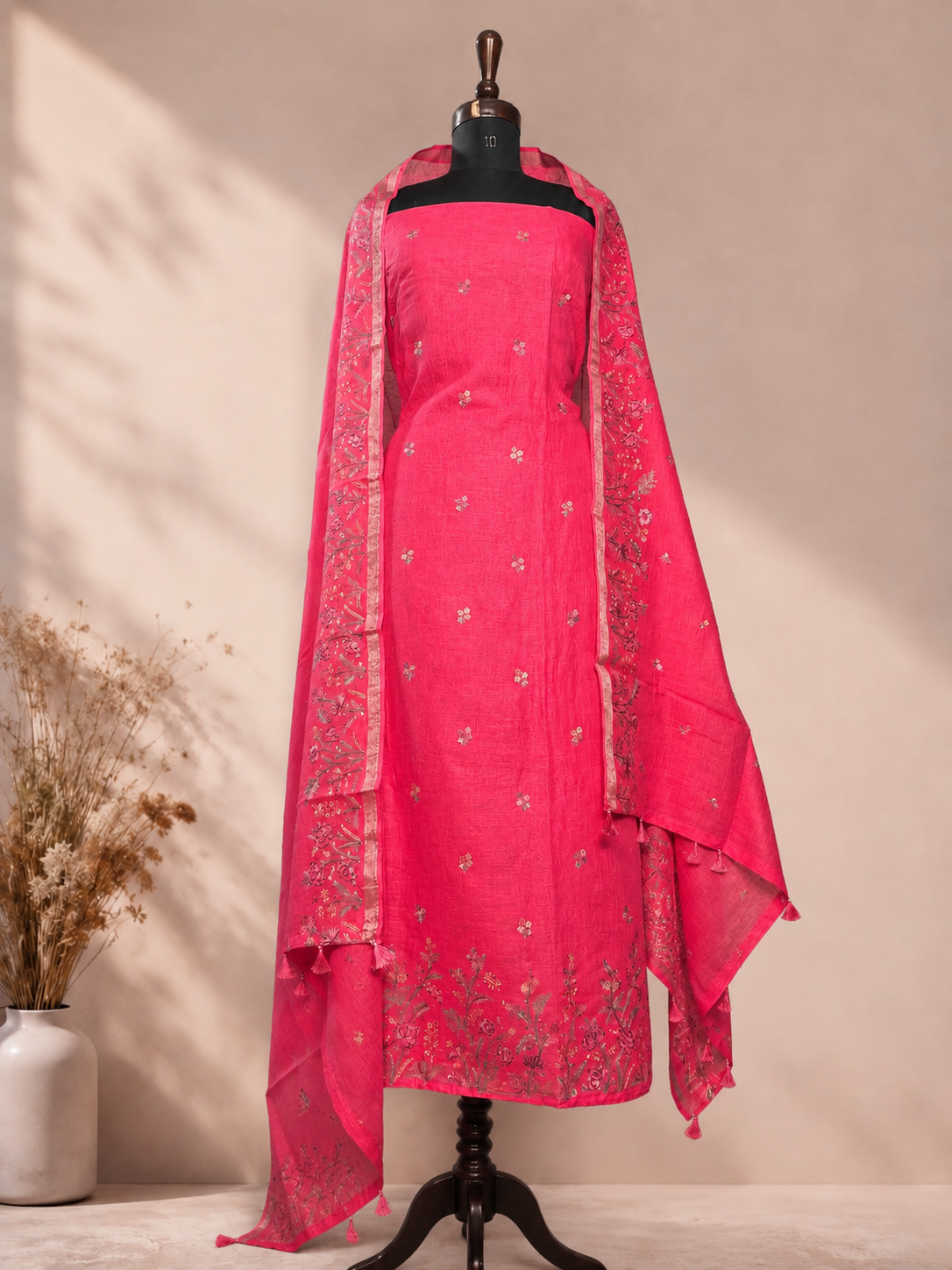 Premium pink linen suit set with fine embroidery and matching dupatta