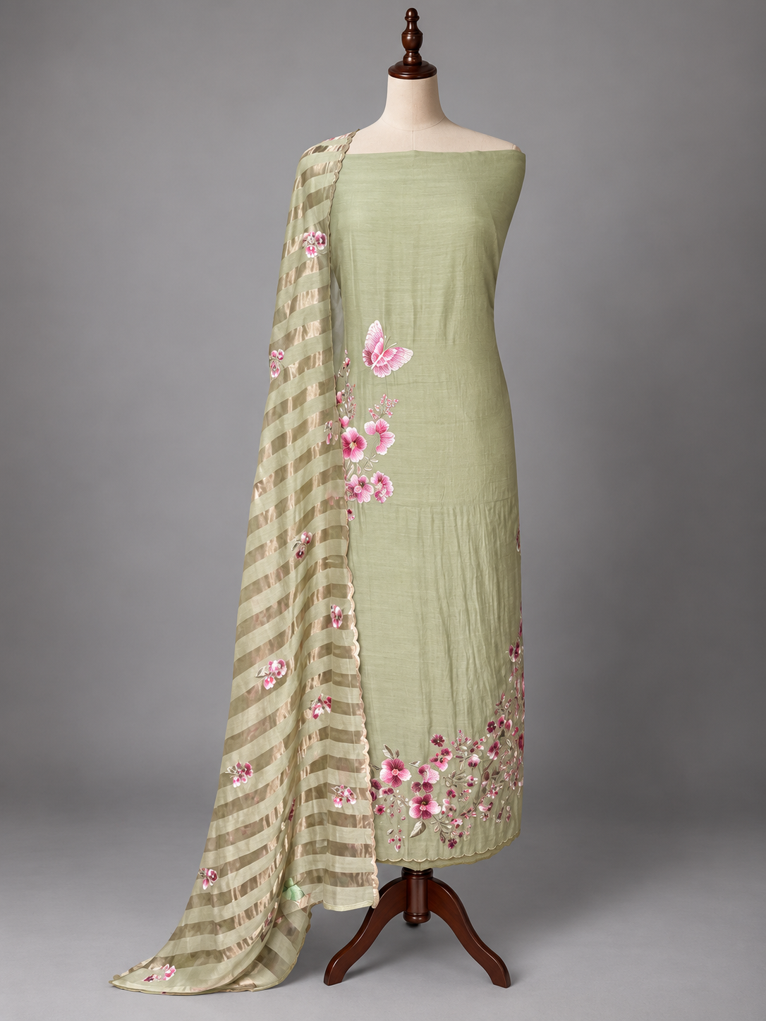 Sage green mul cotton suit set with pink floral embroidery and striped sheer dupatta
