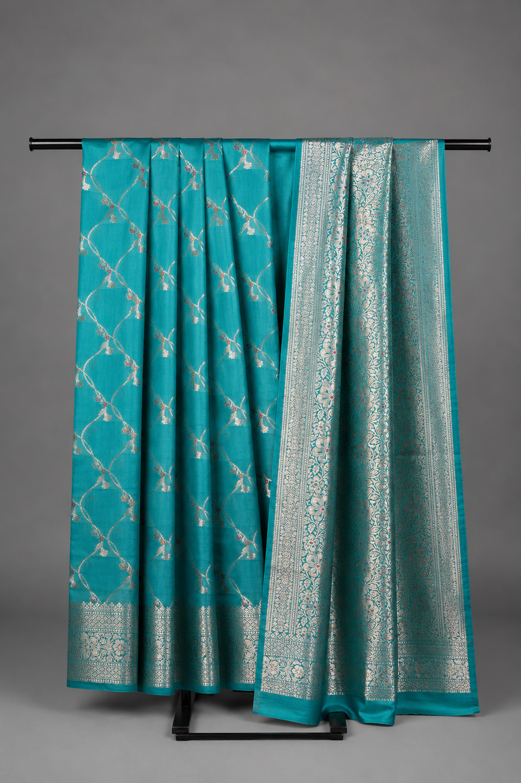 Turquoise blue pure Chiniya silk saree with a fluid drape