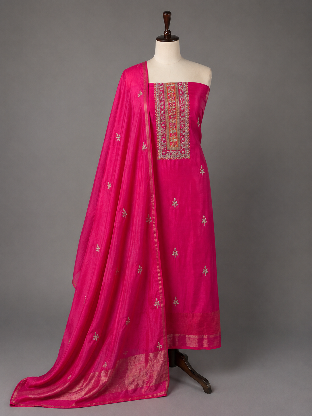 Fuchsia pink mul chanderi suit set with embroidered neckline panel and booti dupatta