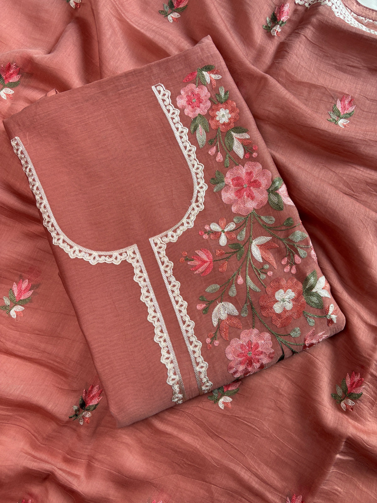 Folded blush peach mul cotton kurta fabric with floral thread work on booti dupatta