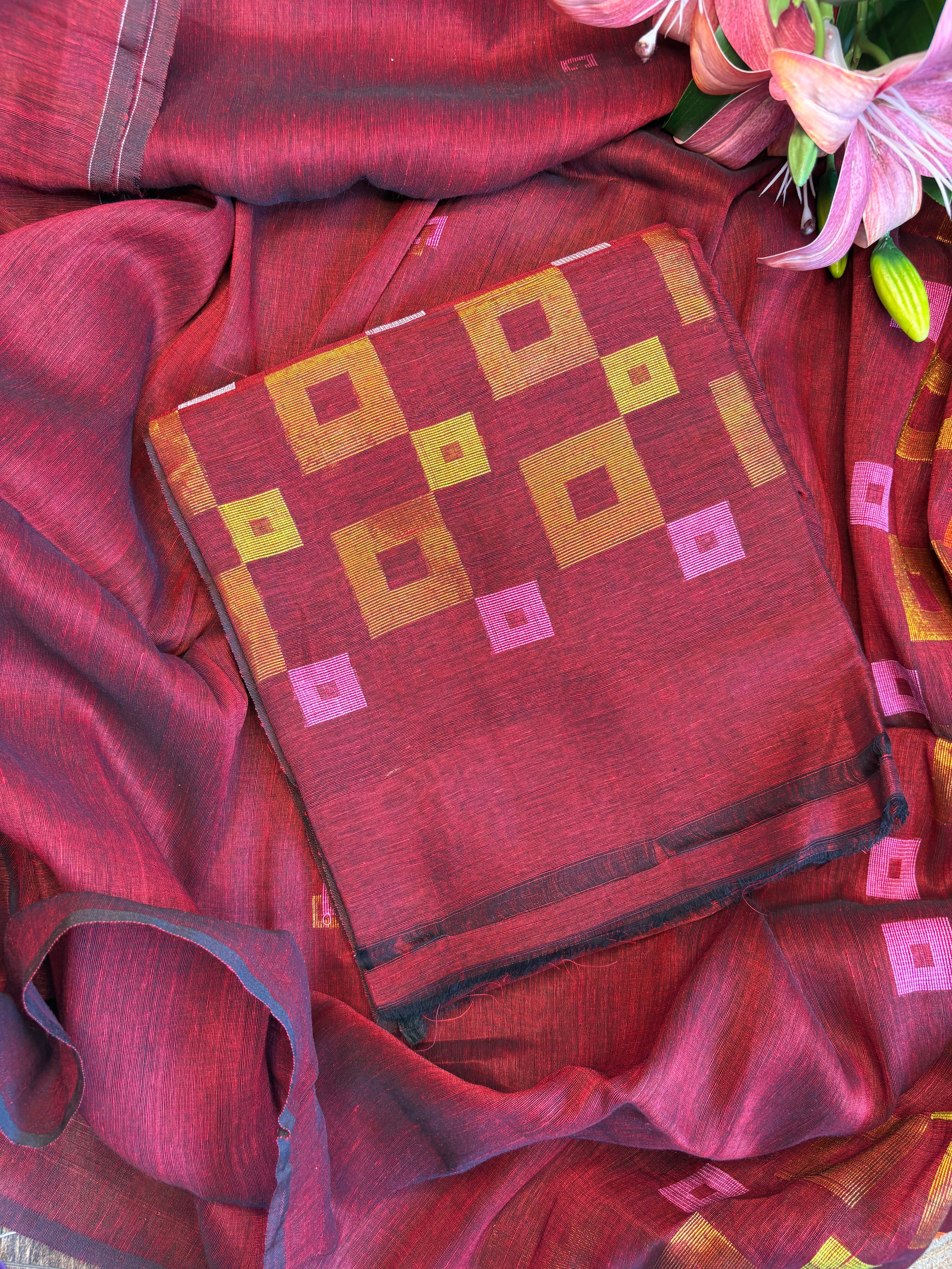 Red pure linen Jamdani dupatta draped to show weave and texture